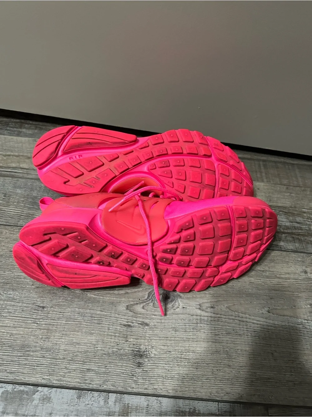 Nike Air Presto sneakers in a vibrant hyper bright hit pink colorway